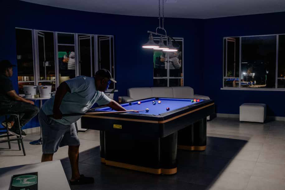 Pool table under blue lights